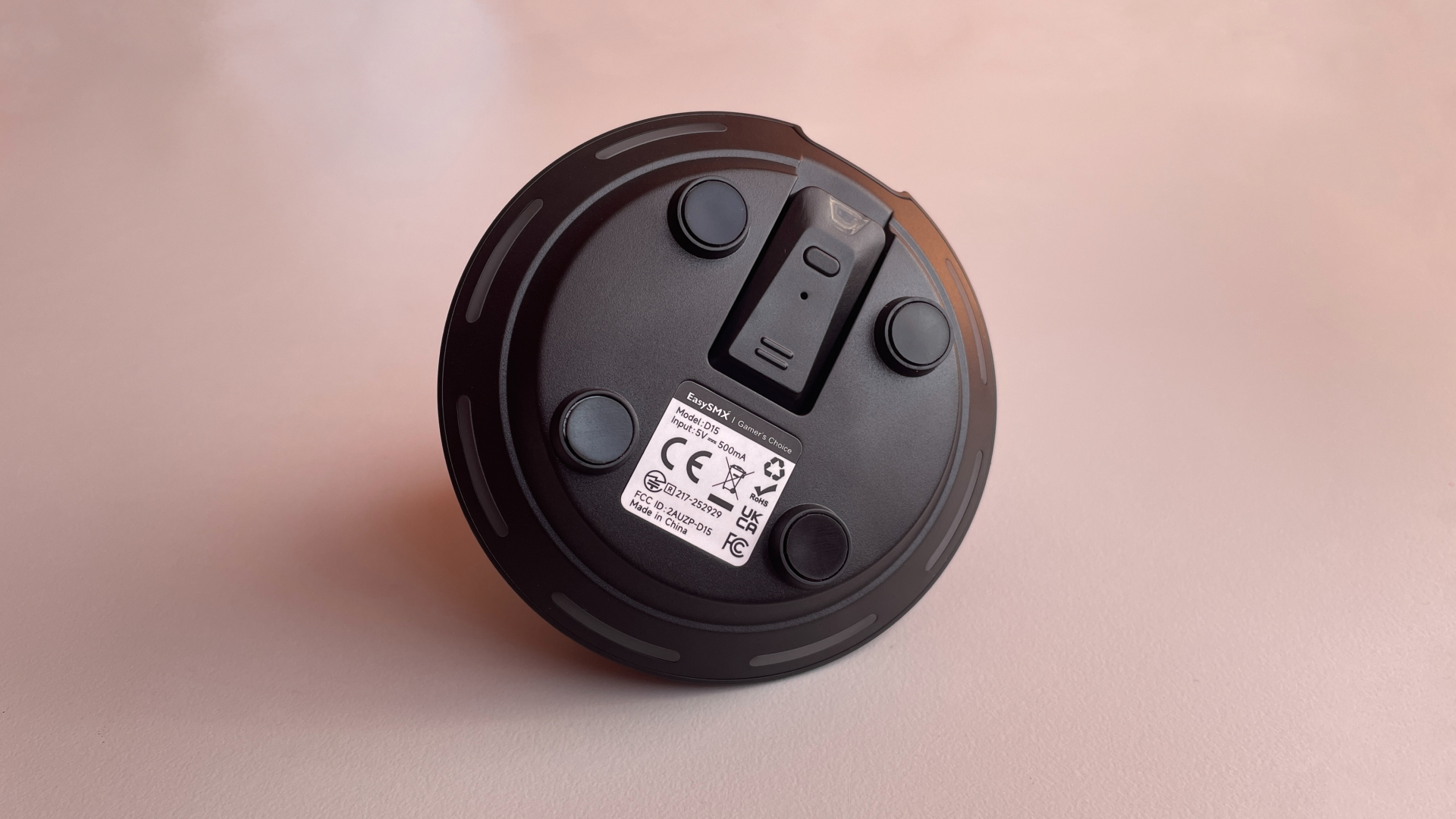 EasySMX Dune 8K Review – A Close Encounter with a One-of-a-Kind Controller 10 The EasySMX Dune 8K’s 2.4 GHz wireless dongle fitted into its dedicated recess on the underside of the charging dock.
