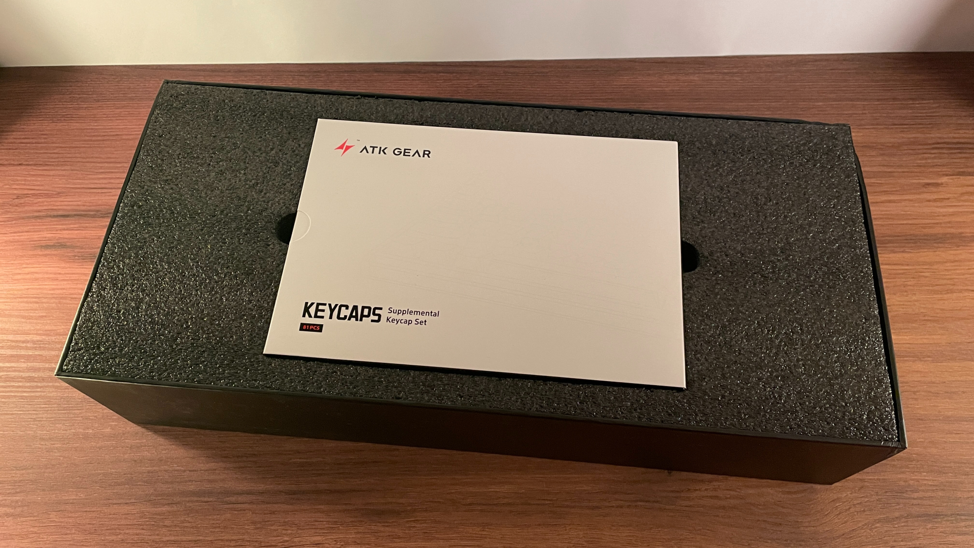 ATK RS7 V2 Ultra Review – A 75% Hall Effect Keyboard With A Twist 4 The open box with the extra PC keycap set packed in the top layer.