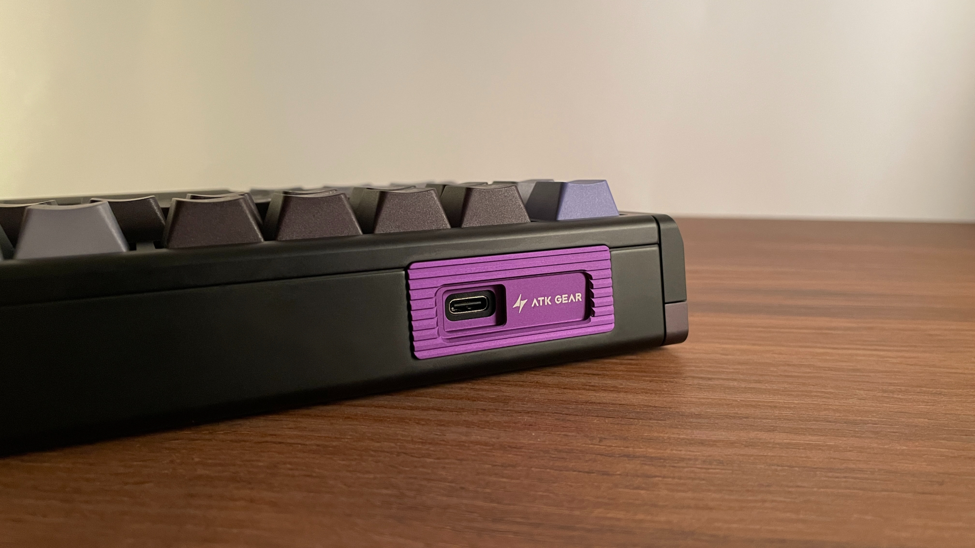 ATK RS7 V2 Ultra Review – A 75% Hall Effect Keyboard With A Twist 17 Purple detailing near the USB-C port on the rear of the ATK RS7 V2 Ultra keyboard.