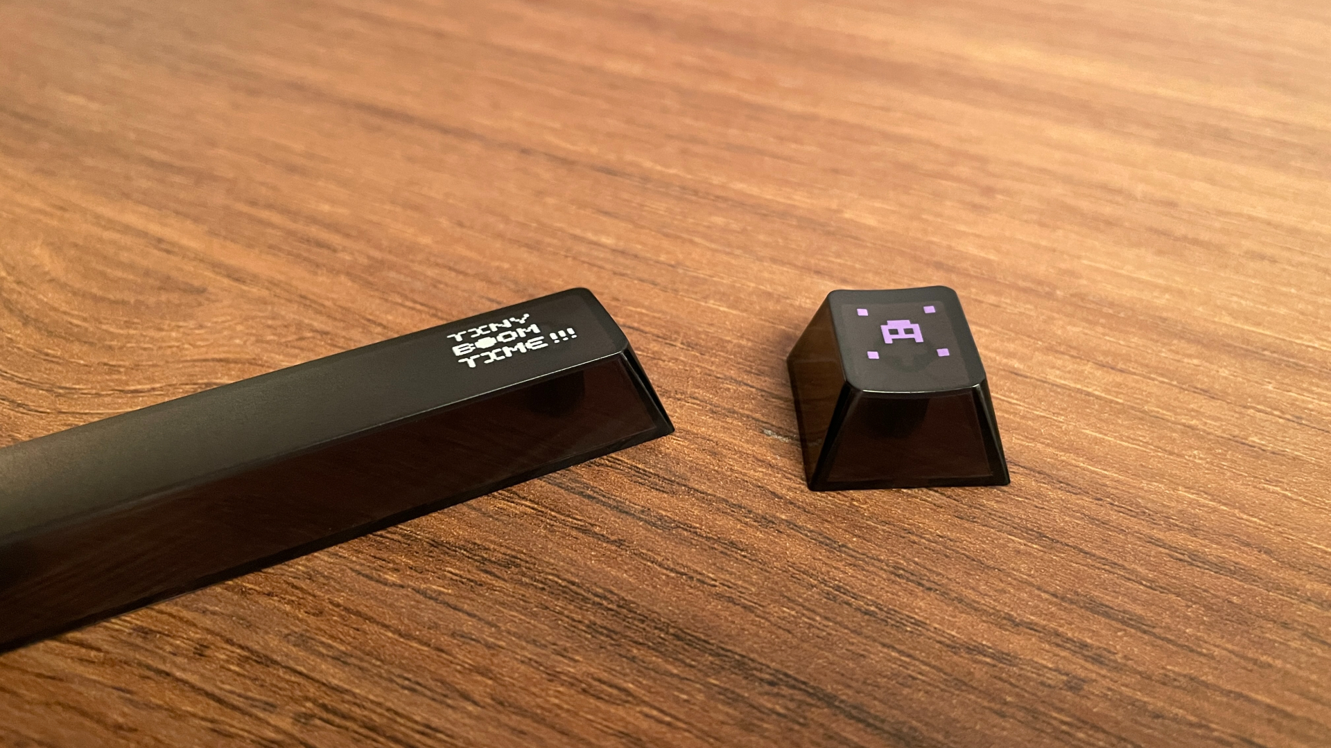 ATK RS7 V2 Ultra Review – A 75% Hall Effect Keyboard With A Twist 34 Several keycaps from the ATK RS7 V2 Ultra showing their gaming-inspired legends and styling.